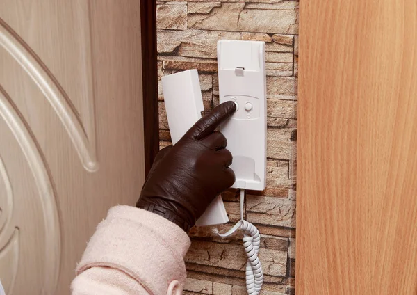 Close Female Hand Glove Presses Intercom Button — Stock Photo, Image