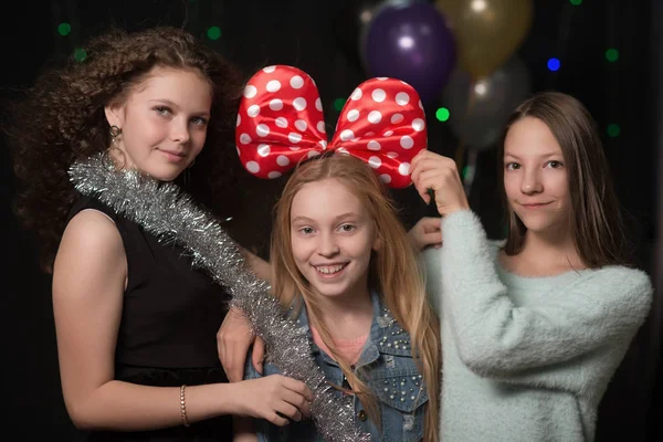 Girls at a party with garlands, balls to have fun — Stock Photo, Image