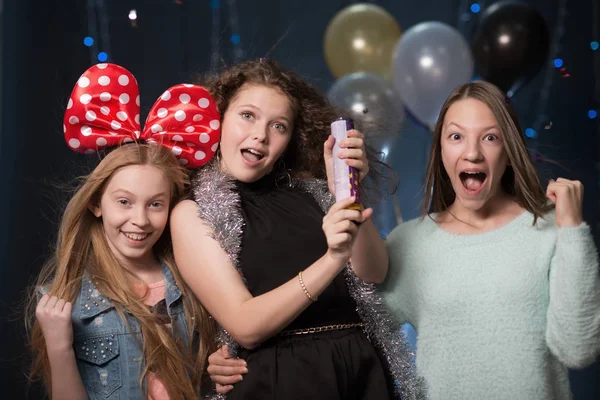 Girls at a party with garlands, balls to have fun — Stock Photo, Image