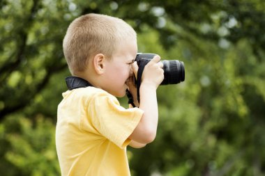 küçük çocuğun fotoğrafçı