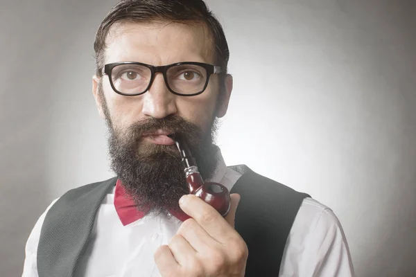 bearded man smoking pipe vintage portrait