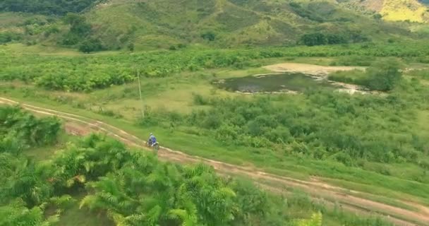 Man Riding Straight Trail Beautiful View Some Trees Lake Aerial — Stock Video