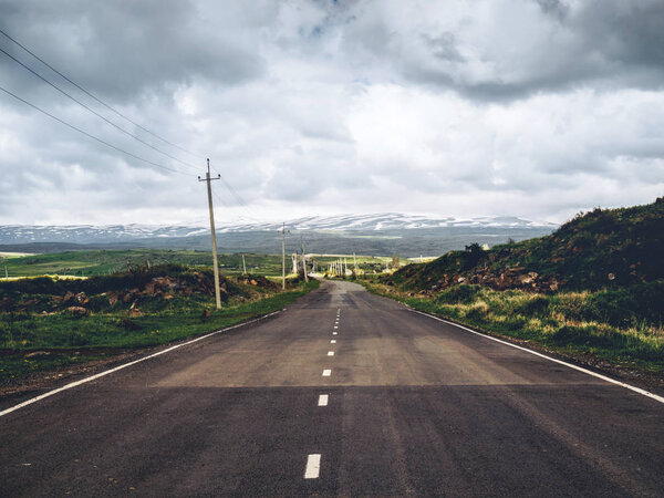 scenic shot of empty road with mountains on background, Armenia