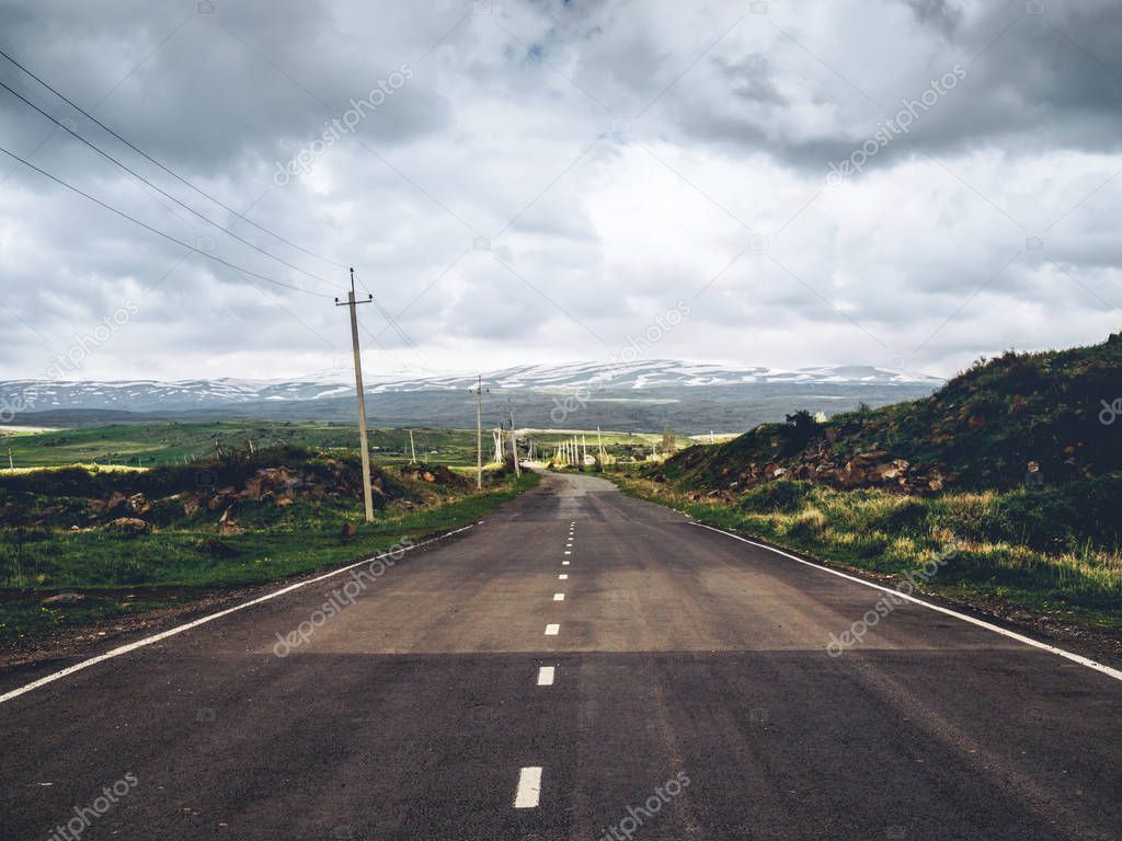 scenic shot of empty road with mountains on background, Armenia