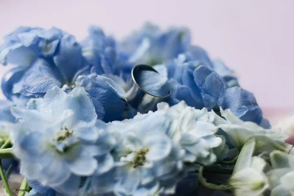beautiful spring bouquet with tender blue flowers, elegant floral decoration