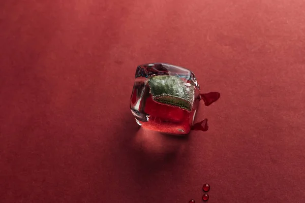 Clear Ice Cube Red Background — Stock Photo, Image