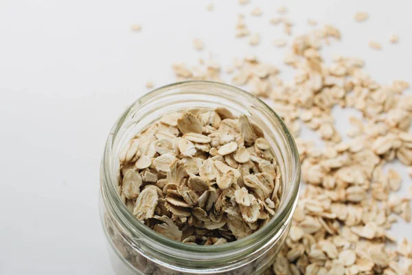 Jar Raw Oat Flakes White Background — Stock Photo, Image