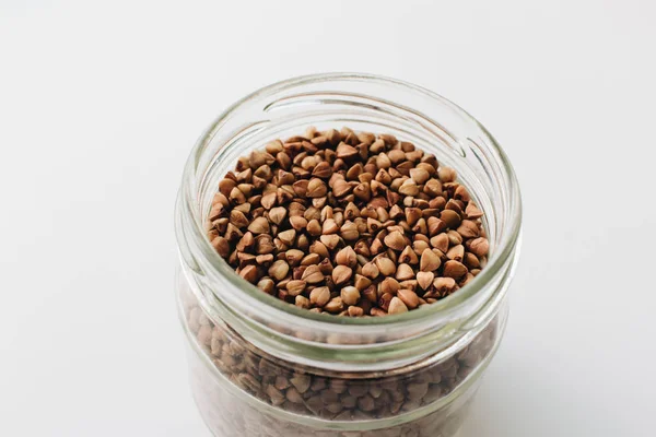 Jar Raw Buckwheat White Background — Stock Photo, Image