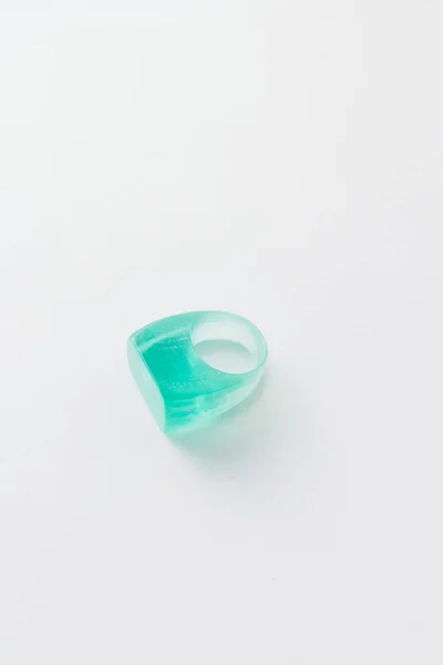 modern style plastic ring on grey background