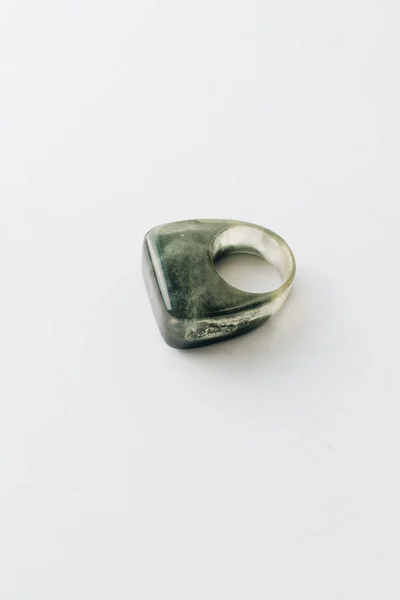 modern style plastic ring on grey background