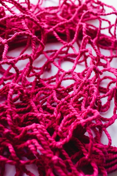 Roze String Tas Achtergrond Netto Patroon — Stockfoto