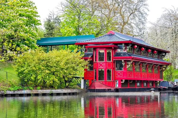 Red Chinese restaurant on Regent\'s canal in London, UK