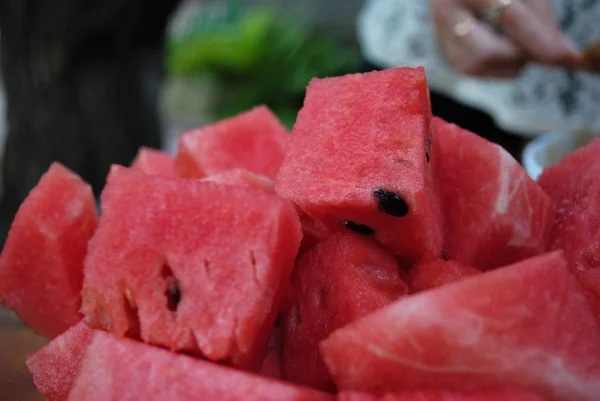 Sliced slices of ripe juicy watermelon. The photo is suitable for your articles about healthy food and health.