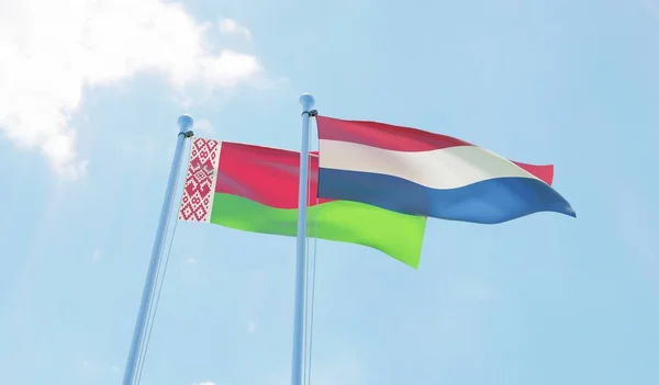 Bělorusko Nizozemsko Dvě Vlají Proti Modré Obloze Obrázek — Stock fotografie