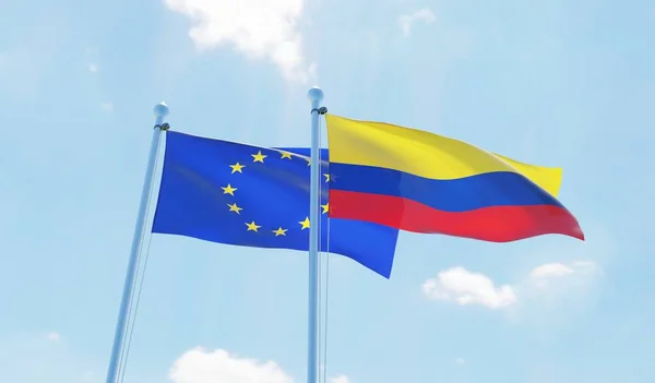Colombia Unión Europea Dos Banderas Ondeando Contra Cielo Azul Imagen — Foto de Stock