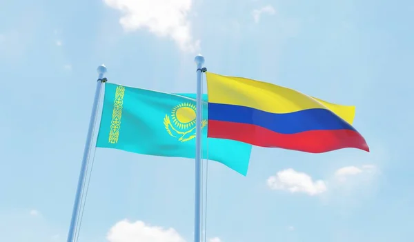Colombia Kazajstán Dos Banderas Ondeando Contra Cielo Azul Imagen — Foto de Stock