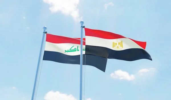 Egypte Irak Twee Vlaggen Zwaaien Tegen Blauwe Hemel Afbeelding — Stockfoto
