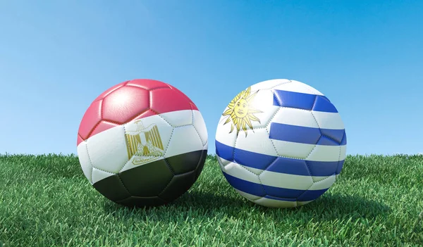 Två Fotbollar Flaggor Färger Grönt Gräs Egypten Och Uruguay Bild — Stockfoto