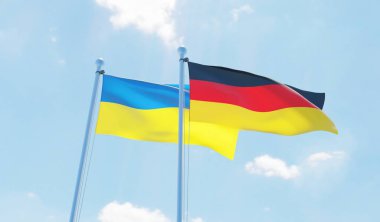 Almanya ve Ukrayna, iki bayrak sallayarak karşı mavi gökyüzü. 3D görüntü