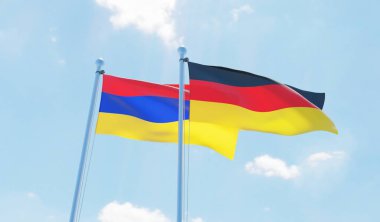 Almanya ve Ermenistan, iki bayrak sallayarak karşı mavi gökyüzü. 3D görüntü