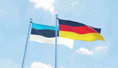 Almanya ve Estonya, iki bayrak sallayarak karşı mavi gökyüzü. 3D görüntü