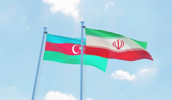 Iran Azerbeidzjan Twee Vlaggen Zwaaien Tegen Blauwe Hemel Afbeelding — Stockfoto