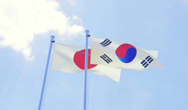 Japón Corea Del Sur Dos Banderas Ondeando Contra Cielo Azul —  Fotos de Stock