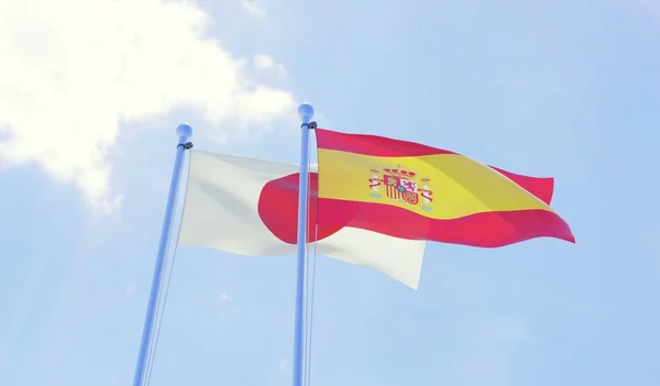 Japonii Hiszpanii Dwie Flagi Macha Przeciw Błękitne Niebo Obraz — Zdjęcie stockowe