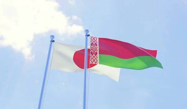Japan and Belarus, two flags waving against blue sky. 3d image