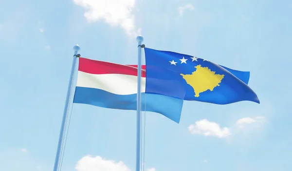 Kosovo Paesi Bassi Due Bandiere Sventolano Contro Cielo Blu Immagine — Foto Stock
