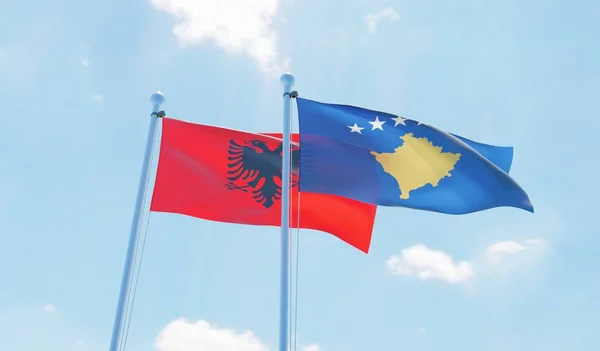 Kosova Arnavutluk Iki Bayrak Sallayarak Karşı Mavi Gökyüzü Görüntü — Stok fotoğraf