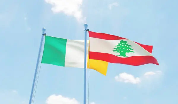 Libano Irlanda Due Bandiere Che Sventolano Contro Cielo Blu Immagine — Foto Stock
