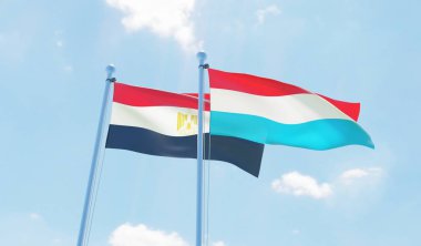 Lüksemburg ve Mısır, iki bayrak sallayarak karşı mavi gökyüzü. 3D görüntü