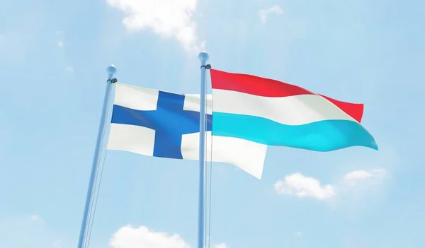 Люксембург Финляндия Два Флага Размахивающих Голубым Небом Изображение — стоковое фото