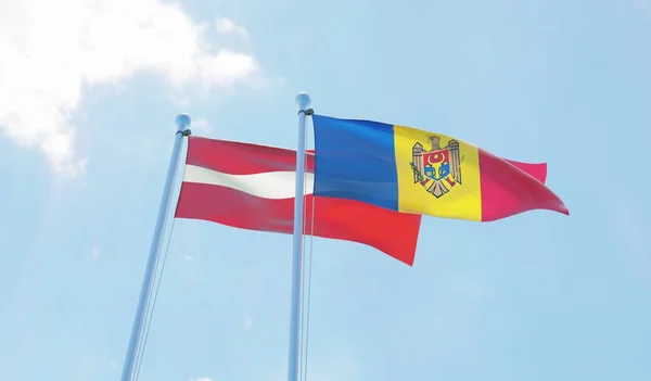 Moldavia Lettonia Due Bandiere Sventolano Contro Cielo Blu Immagine — Foto Stock