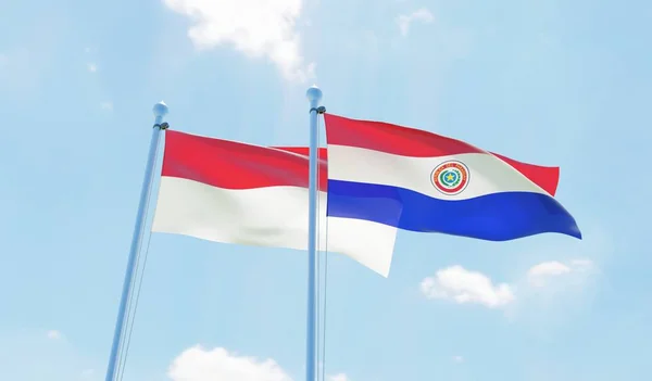 Paraguay Och Indonesien Två Flaggor Vajande Mot Blå Himmel Bild — Stockfoto