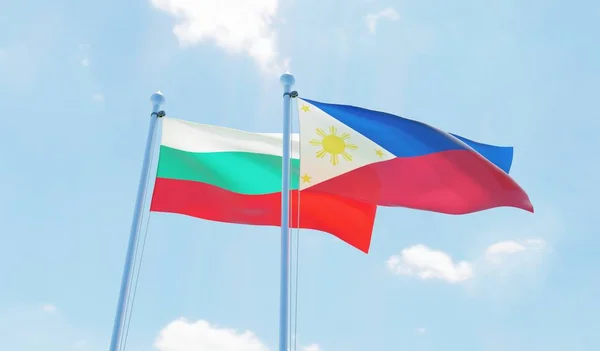 Filippinerna Och Bulgarien Två Flaggor Vajande Mot Blå Himmel Bild — Stockfoto