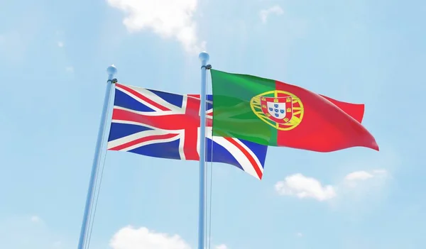 葡萄牙和英国 两个旗帜挥舞着蓝天 — 图库照片
