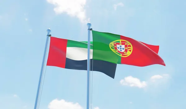 Portugalia Zjednoczone Emiraty Arabskie Dwie Flagi Macha Przeciw Błękitne Niebo — Zdjęcie stockowe