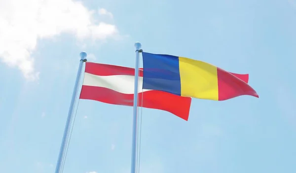 Romania Austria Due Bandiere Sventolano Contro Cielo Blu Immagine — Foto Stock