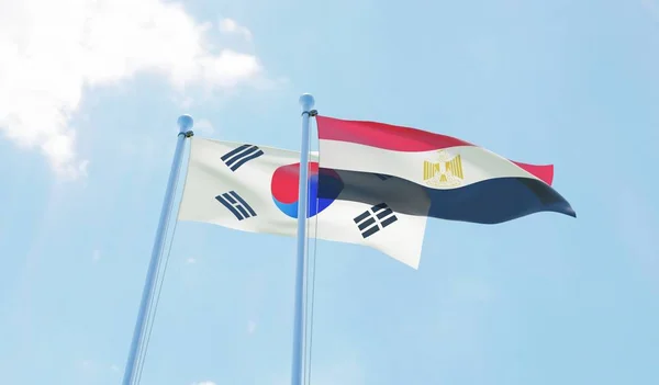Южная Корея Египет Два Флага Размахивающих Голубым Небом Изображение — стоковое фото