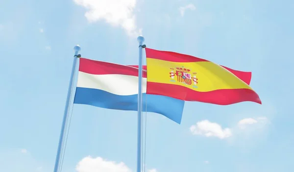 Hiszpania Holandia Dwie Flagi Macha Przeciw Błękitne Niebo Obraz — Zdjęcie stockowe