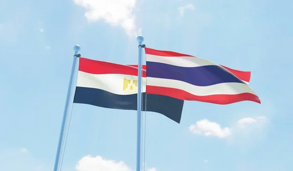 Tailândia Egito Duas Bandeiras Acenando Contra Céu Azul Imagem — Fotografia de Stock