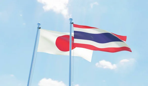 Thaïlande Japon Deux Drapeaux Agitant Contre Ciel Bleu Image — Photo