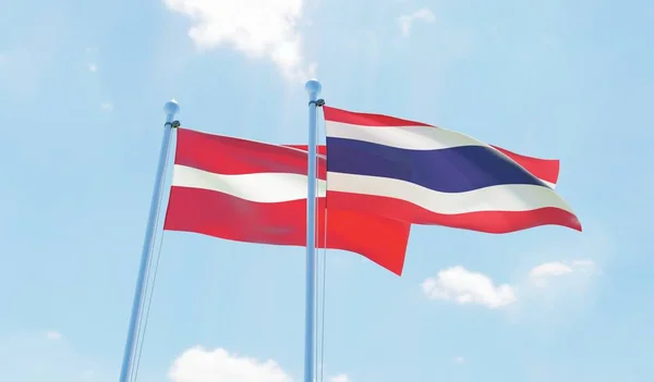 Tailândia Letônia Duas Bandeiras Acenando Contra Céu Azul Imagem — Fotografia de Stock