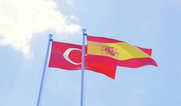Turkije Spanje Twee Vlaggen Zwaaien Tegen Blauwe Hemel Afbeelding — Stockfoto