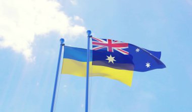 Ukrayna ve Avustralya, iki bayrak sallayarak karşı mavi gökyüzü. 3D görüntü