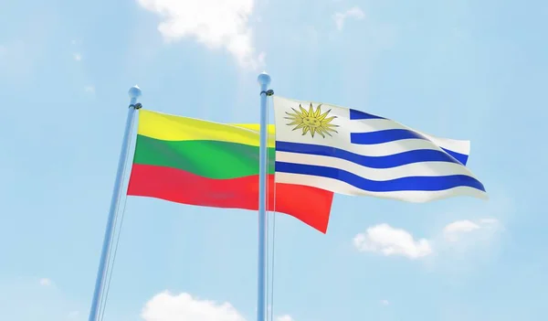 乌拉圭和立陶宛 两旗飘扬在蓝天上 — 图库照片