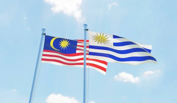 Uruguay Dan Malaysia Dua Bendera Melambai Melawan Langit Biru Citra — Stok Foto