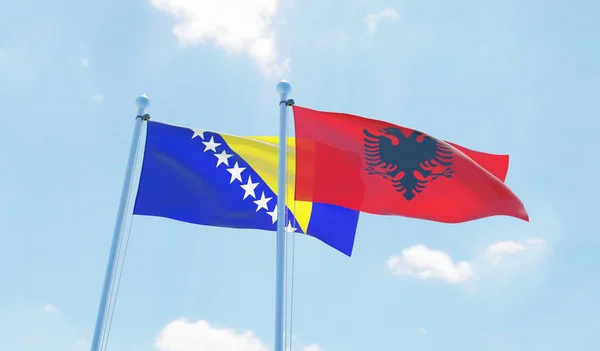 Arnavutluk Bosna Hersek Iki Bayrak Sallayarak Karşı Mavi Gökyüzü Görüntü — Stok fotoğraf